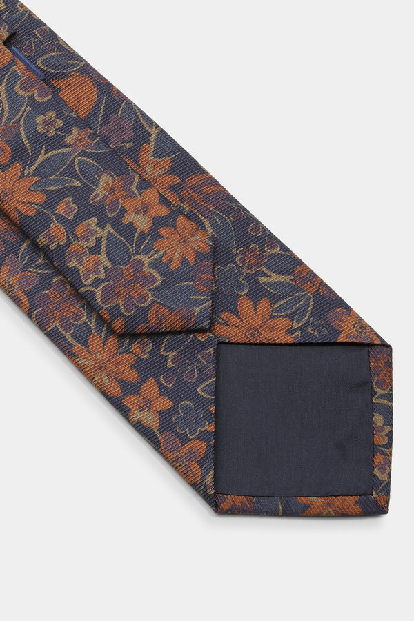 Mørkeblåt orangeblomstret slips